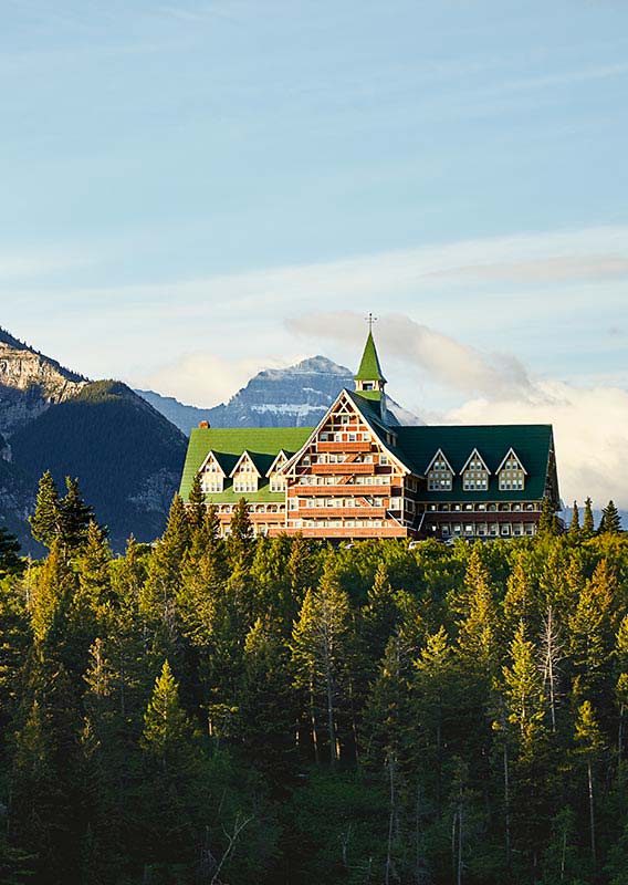 The Prince of Wales hotel sits underneath mountains