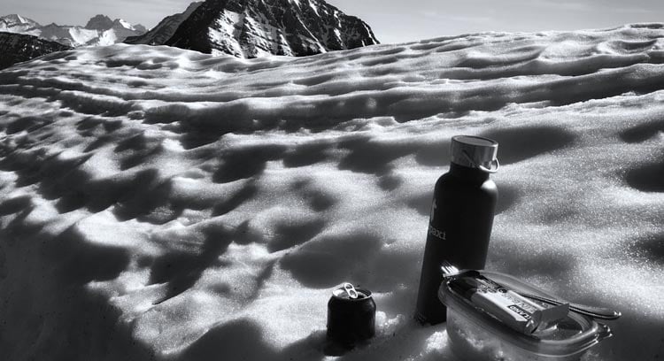 Waterbottle resting in the snow