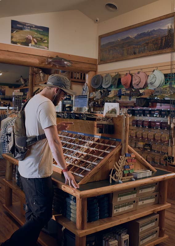 A man browses inside a Fly Shop