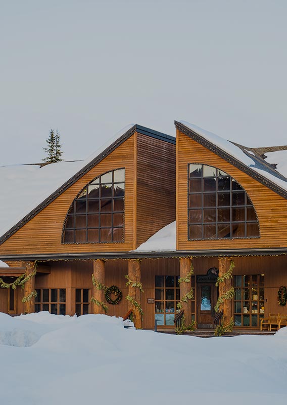 The wooden Belton Chalet at a narrow roadside.