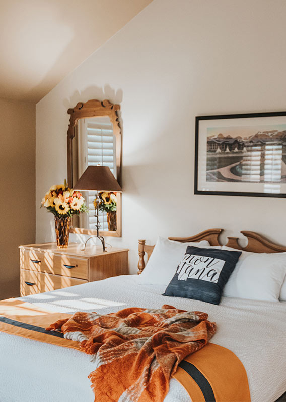 a bed in a hotel room