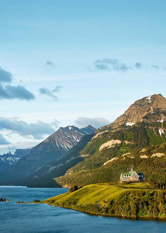 Prince Of Wales Hotel Iconic Accommodation In Waterton Alberta Prince Of Wales Hotel On The Bluff Overlooking Upper Waterton Lake With A Dramatic Mountain Backdrop