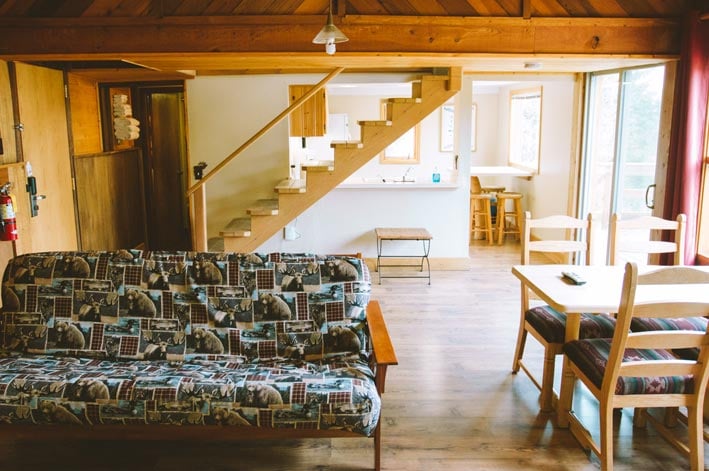 A living area with a couch and table.