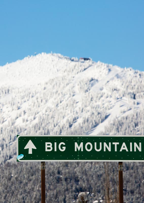 A view up Whitefish Mountain Resort covered in snow