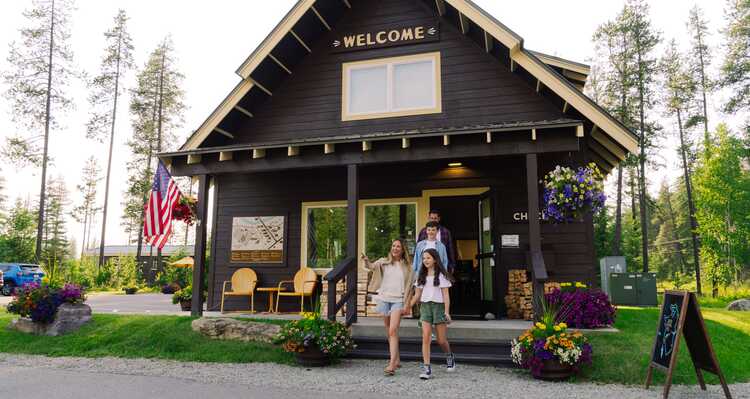 Family exiting West Glacier Camp Store