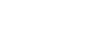 Staff member at Glacier National Pizza presenting a fresh baked pizza