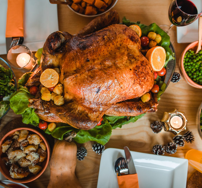 A top view of a turkey dinner set on a dining table.