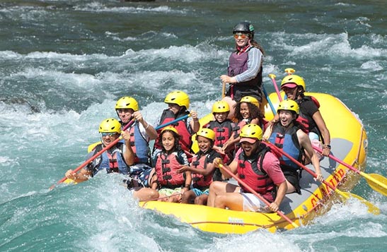 Group on a whitewater raft.