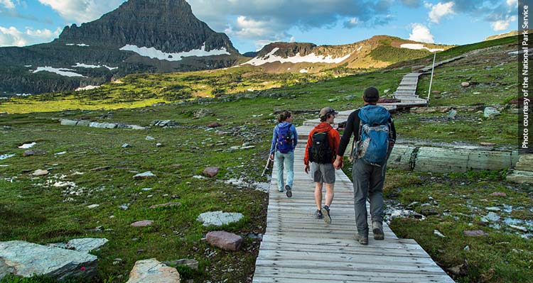 Hikers on the Hidden Lake Trail in Glacier National Park.