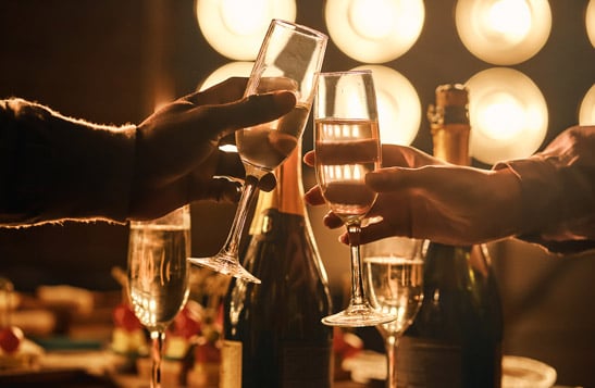 People toasting with glasses of champagne
