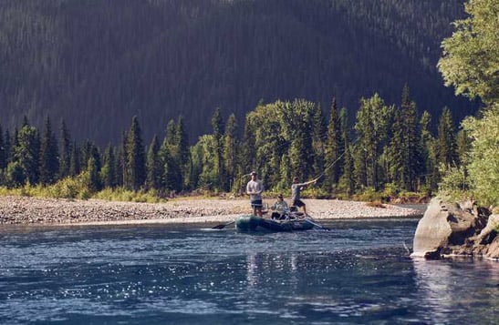 People fishing from a raft on the Flathead River