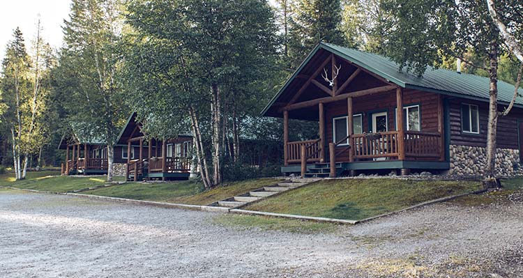Exterior of Paddle Ridge cabins in the summer.